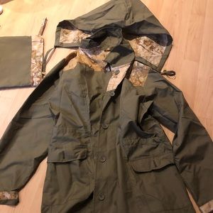Designer raincoat with pouch